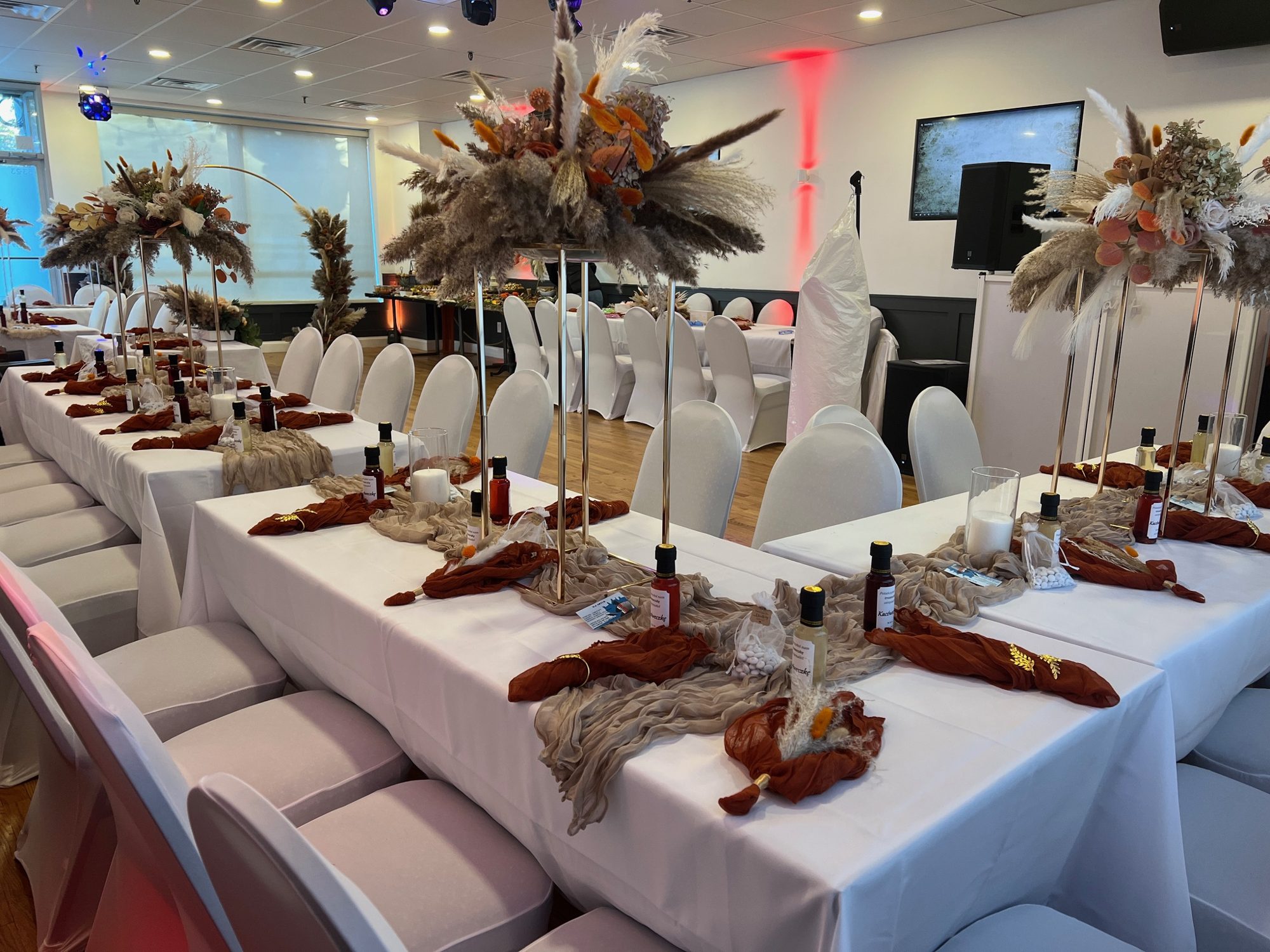 Boho long-table private party with pampas centerpieces at The Space Next Door, Ridgewood